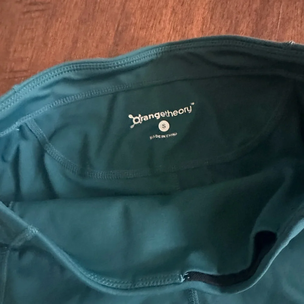 Orangetheory Teal Bike Shorts with Orange Accents and Socks - Picture 3 of 4